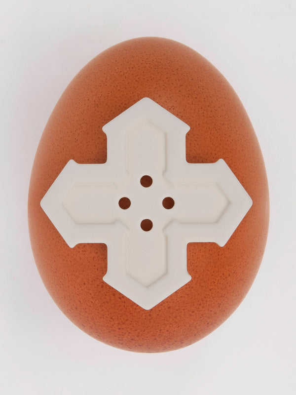 The Nix on a brown egg