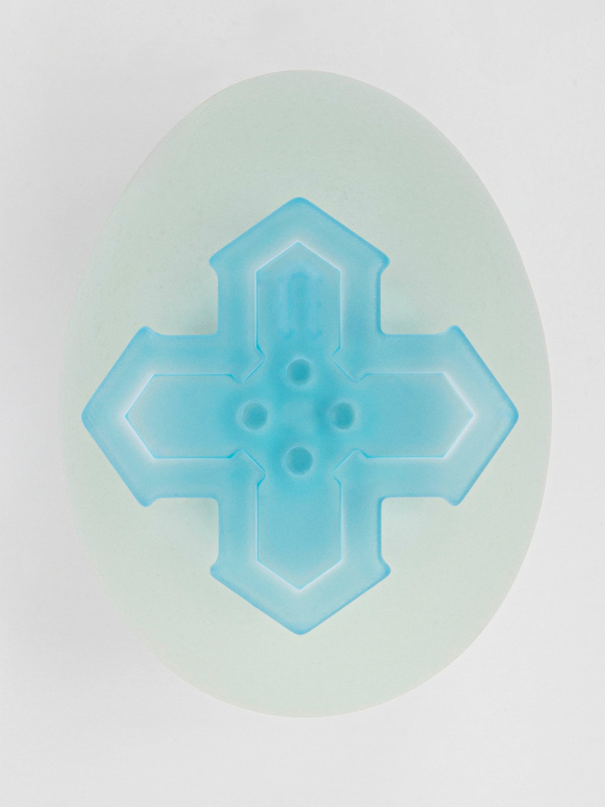 The Opaline on a white egg